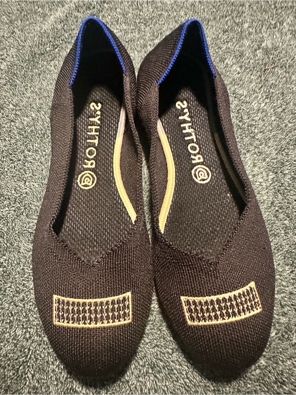 Rothy's Black Knit Flats with Tan Stitching and Blue Trim